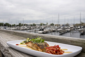 Seared salmon served at BoDocks in Muskegon, Mich. on Saturday, May 23, 2026. After changing ownership the restaurant formerly known as Dockers Fish House reopened after a year long closure.